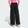 Wide Leg PantsGenerously cut sweatpants made of cotton-blend fleece. These juniors' sweatpants are the definition of casual comfort. Made from soft fleece with a roomy cut, they're perfect for downtime or anytime you want to feel cozy. The embroidered Trefoil logo on the leg gives them that classic adidas signature.